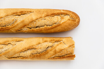 French baguette on a white background. macro shot of fresh bread, organic baked goods