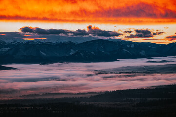 A Golden Farewell from the Sun as the Frozen Landscape Succumbs to the Encroaching Twilight