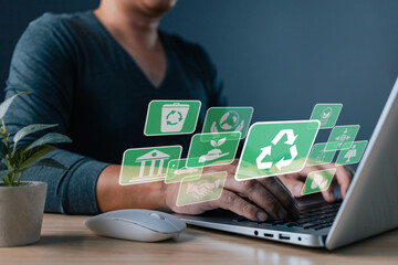 A person uses software to save energy and promote a sustainable environment, supporting ESG...