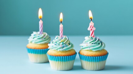 Cupcakes with candles burning bright,
Forming the numbers two-three-four in sight.
Blue backdrop enhances their light,
A sweet treat to make your birthday a delight.