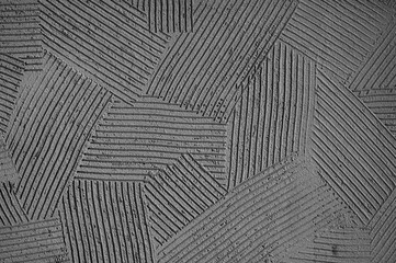 gray decorative plaster on the wall close-up