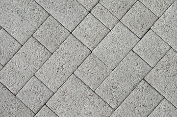 gray rectangular paving stones close-up top view