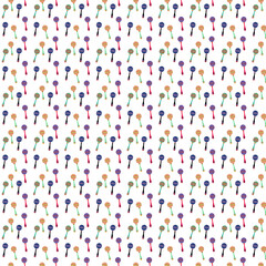 Colorful maracas background with long handle and round patterned top in bright shades.