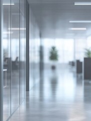 Modern office space with sleek glass walls and contemporary furniture.