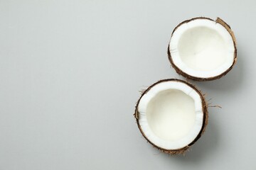 Coconut on gray background, top view