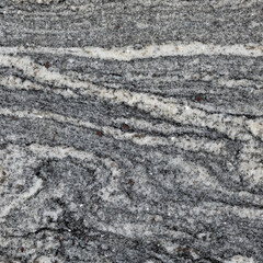 Detailed View of Dark Gray Granite with Swirling Patterns and Natural Beauty