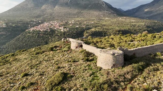Aerial view of Kelefa Castle and its tower and walls during sunset, Mani, Laconia, Greece.