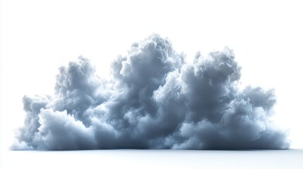 Fluffy white and gray cumulus cloud formation in a clear blue sky