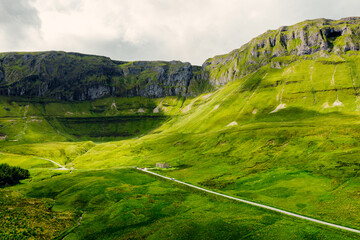 Irish Mountain Majesty: Aerial Exploration of Gleniff Horseshoe on a Sunny Day with Stunning Landscapes and Outdoor Adventures