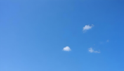 White colour clouds against blue sky. Cloudscape Background. Full frame of the blue sky with white storm clouds. Bright Blue Sky and White Fluffy Clouds