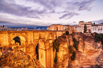 Illuminated Puente Nuevo Bridge at Dusk in Ronda, Andalusia © romanslavik.com