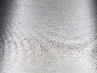 Close-up detail of a metal brake disc, showcasing intricate patterns and textures. Industrial...