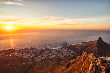 Cape Town Sunset Aerial View from Table Mountain over Camps Bay, Lion's Head and Twelve Apostles in the Background