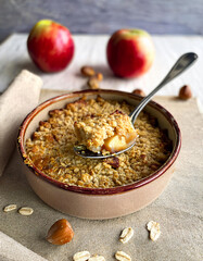 Golden Apple Oat Crumble in a Rustic Ceramic Dish