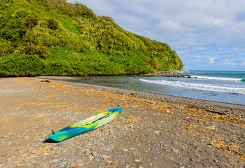 Colorful Kayak on Black Sand Beach From Honomanu Bay, Honomanu Beach Park, Maui, Hawaii, USA