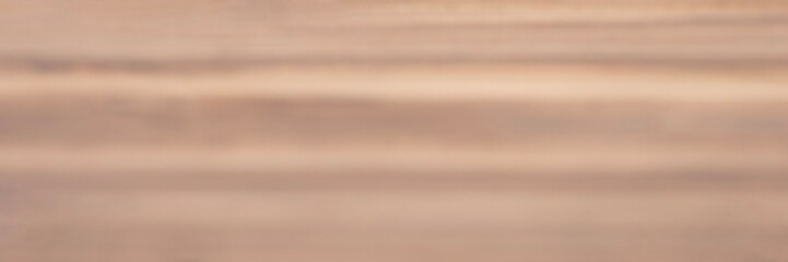 Beige wood texture background with natural grain and subtle horizontal patterns