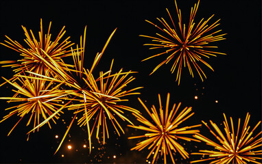 Stunning golden fireworks exploding against a dark night sky, symbolizing celebration and festivity.