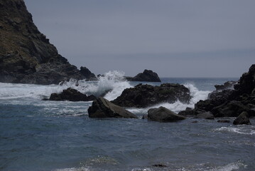 Waves crashing on rocks