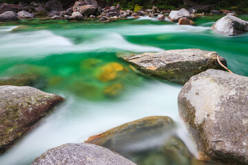 lake in the Valle Verzasca with blue turquoise water with long exposure frozen, long exposure