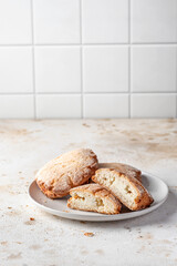 Sochniki (sochni) with cottage cheese. Shortbread cookies with cottage cheese on white kitchen table background isolated