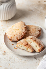 Sochniki (sochni) with cottage cheese. Shortbread cookies with cottage cheese on white kitchen table background close up
