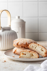 Sochniki (sochni) with cottage cheese. Shortbread cookies with cottage cheese on white kitchen table background. Tea time