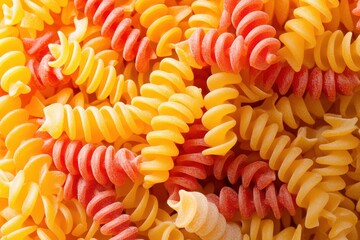 A vibrant close-up of assorted colored pasta, showcasing a variety of shapes and hues, perfect for culinary inspiration or food photography.