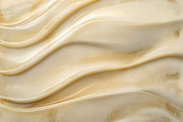 Obraz premium A soft, wavy sand dune texture with warm golden hues, flowing organic patterns, and a smooth, undulating appearance.
