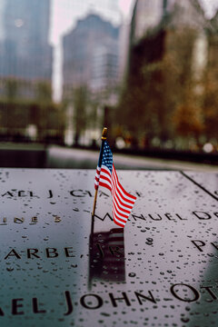 Ground Zero Memorial, an American Flag standing on top of the names,  New York City