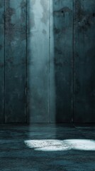 Sleek smooth cement wall in cool charcoal gray with moody lighting
