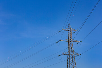 High voltage pylon in the French countryside. 225kV High voltage electric power grid.