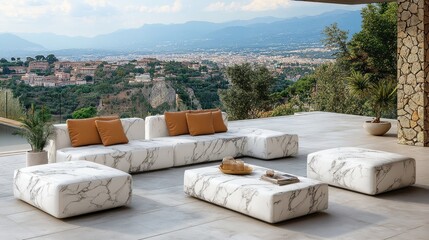Modern outdoor lounge area with marble furniture and scenic mountain view.
