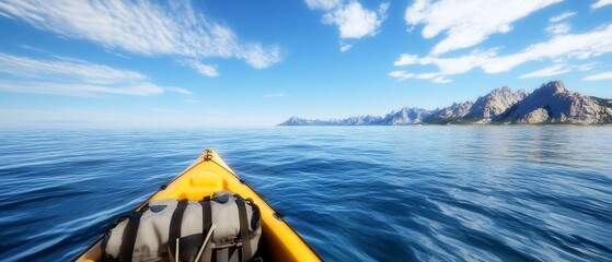 Kayaking coastal mountains, sunny day.  Ocean view, adventure travel