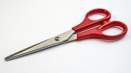 Obraz premium Red Scissors on White Background