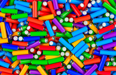 Fototapeta premium Batteries size AA, different colors background, wallpaper. 3D rendering