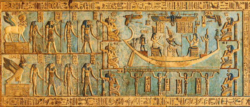 Carvings on the ceiling with restored painting in the temple of Hathor at Dendera in Egypt