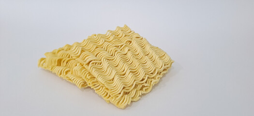 raw instant noodles on white background with copy space for text.	