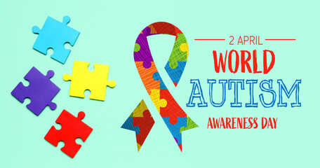 Puzzle pieces on green background. World Autism Awareness Day