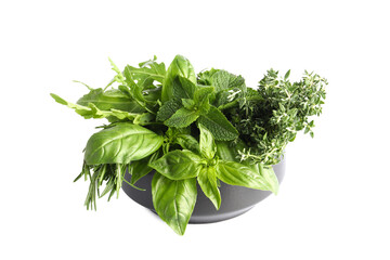Bowl with fresh herbs isolated on white background
