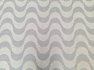 Outdoor grey and white ceramic in wavy or waves pattern. Usually found at public place such as...