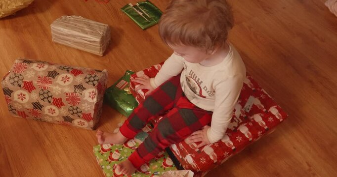 Cute Toddler Waiting To Open Presents on Christmas