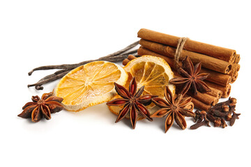 Anise stars with cinnamon, vanilla sticks and slices of dried orange on white background