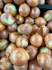 pile of onions in a market