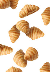 Delicious croissants in air on white background. Puff pastry