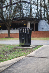 black metal trash can in the park