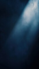 Obraz premium Midnight blue background with smooth texture and blurred white spotlight