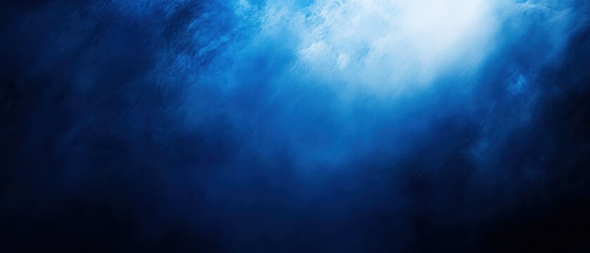 Midnight blue background with smooth texture and blurred white spotlight
