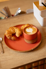Steaming Elegance: Artisan Coffee Cup in a Modern Café 