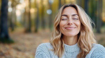 Joyful woman immersed in the tranquility of a spring forest getaway