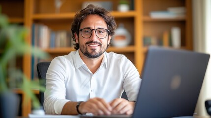Focused Brazilian businessman learning online in his home office